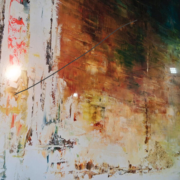 The gray line shows a barely visible scratch on the plexiglas picture