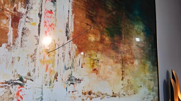 The gray line shows a barely visible scratch on the plexiglas picture